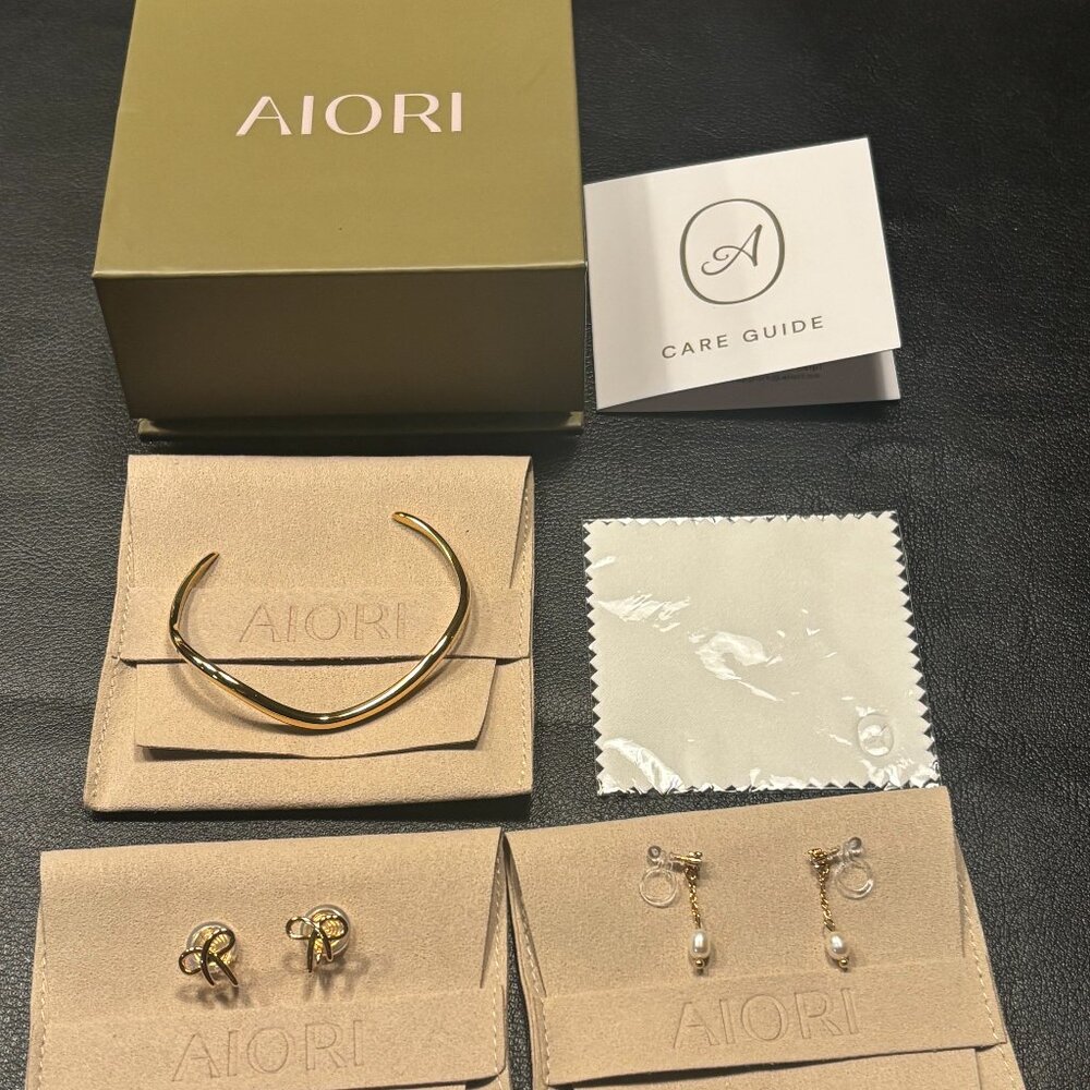 3 Pieces of AIORI Jewelry: 2 clip on earrings - 1 bangle - NWOT